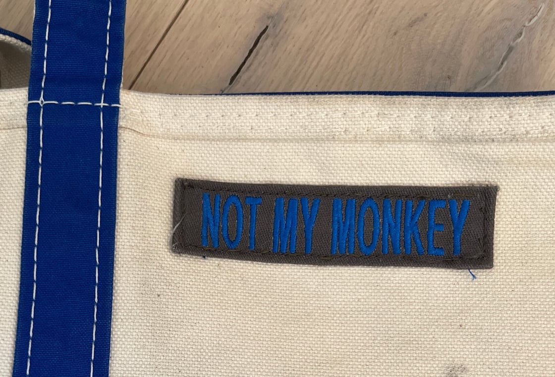 Image of tote patch reading 